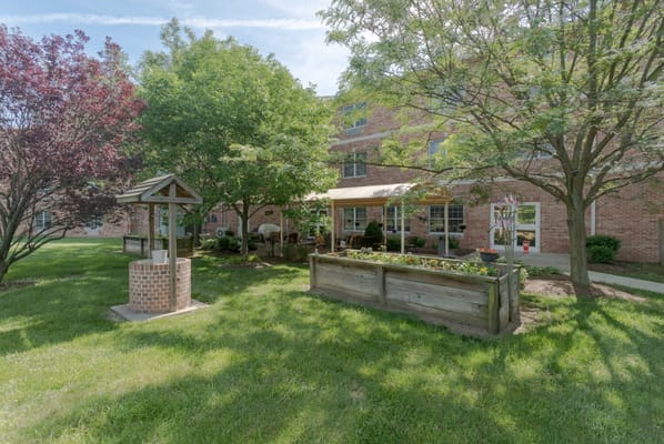 Outdoor view of the facility with gardens and landscaping