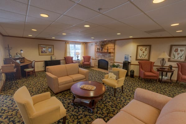 Cozy common area with seating and fireplace