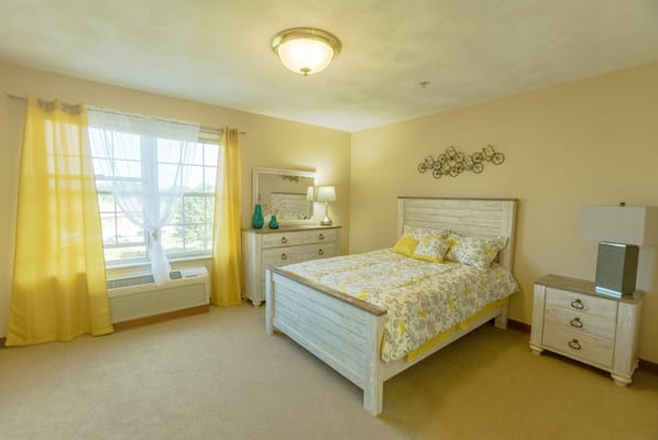 Cozy bedroom with a bright window and decor