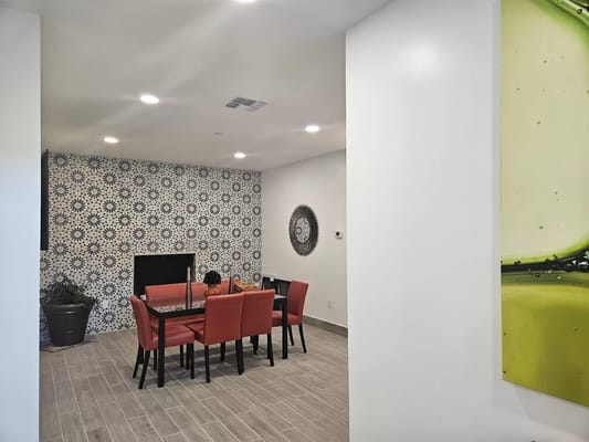 Interior common area with dining table and chairs