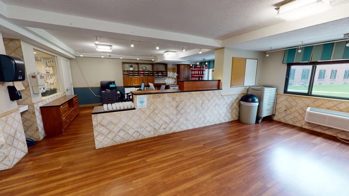 Bright reception area with wooden flooring