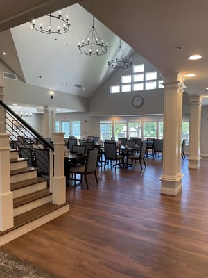 Spacious dining room with modern decor and lighting