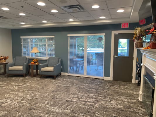 Common area with seating and a view of the porch