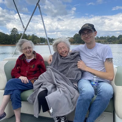 Residents enjoying a boat ride on a sunny day
