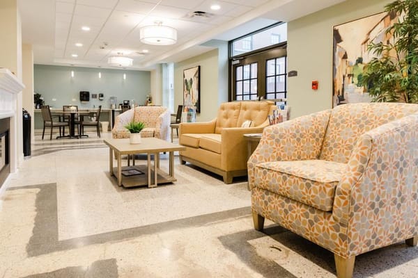 Cozy interior common area with seating and artwork