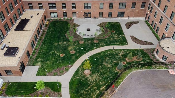 Aerial view of landscaped outdoor space at a senior living facility