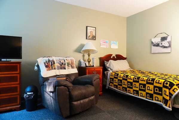 Cozy private resident room with personal items