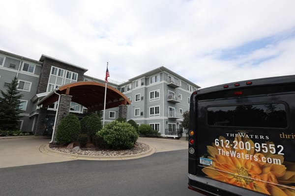 Exterior view of The Waters on 50th entrance with shuttle