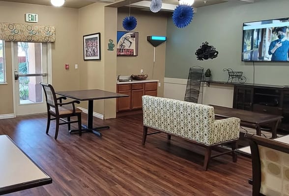 Bright common area with seating and decor