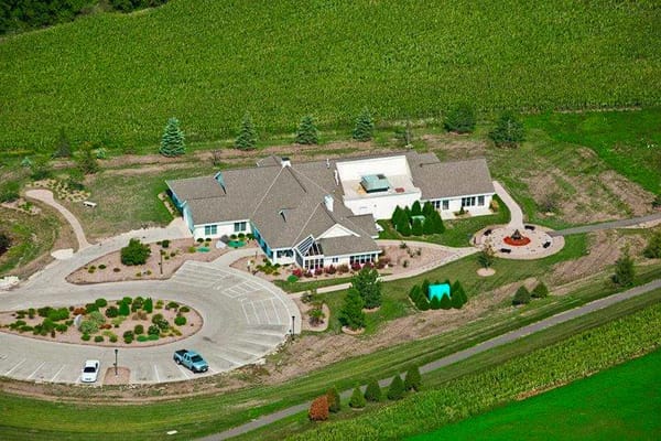 Aerial view of Kathy Hospice surrounded by greenery