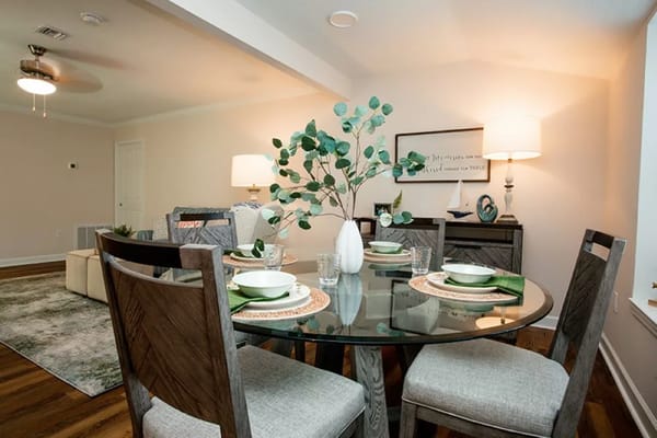 Interior view of a dining area with a glass table