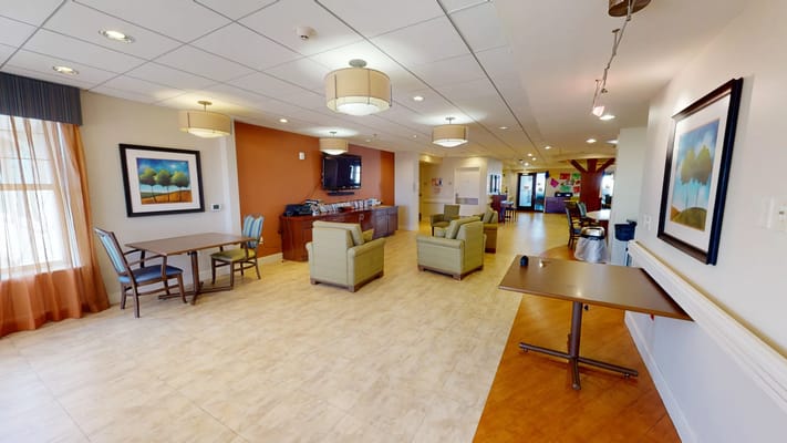 Bright common area with seating and decor