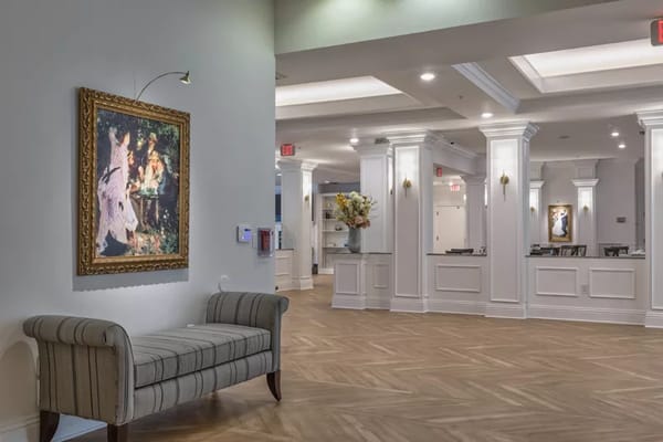 Interior view of a lobby area in Naples Green Village