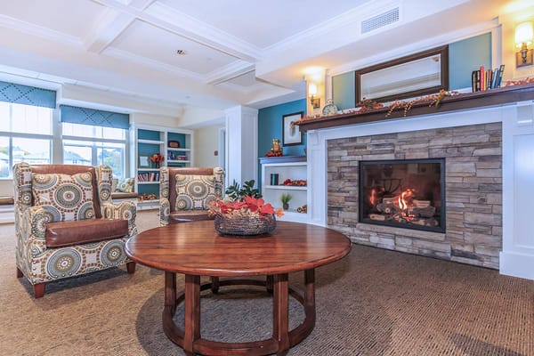 Cozy common area with a fireplace and seating