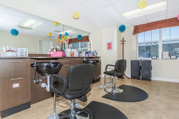 Interior of a beauty salon with styling chairs