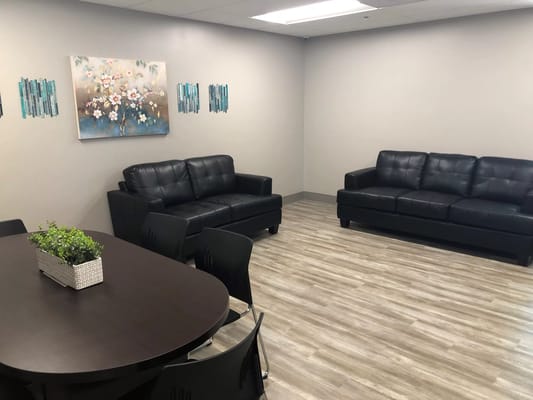 A cozy seating area in a wellness room