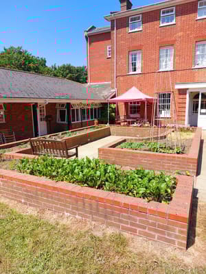 Garden area with benches and raised flower beds