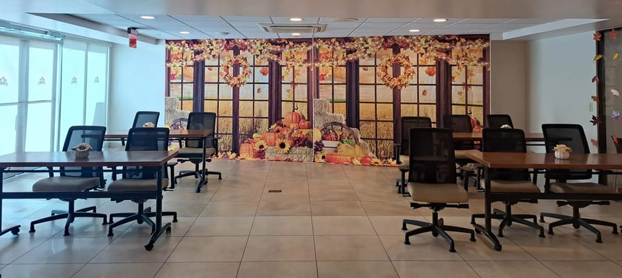 Interior of a common area decorated with a seasonal backdrop