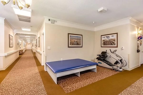 Interior view of a therapy room with exercise equipment