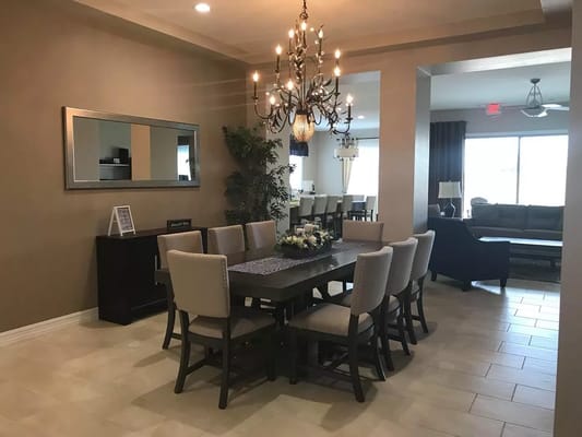 Bright dining area with a large table and seating