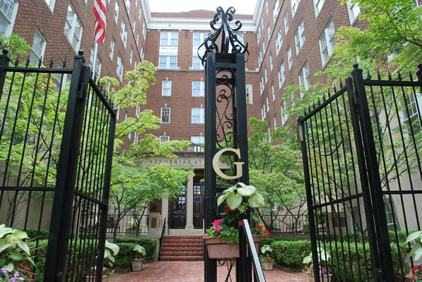 Entrance gate featuring the 'G' logo at Greenbriar at the Altamont.