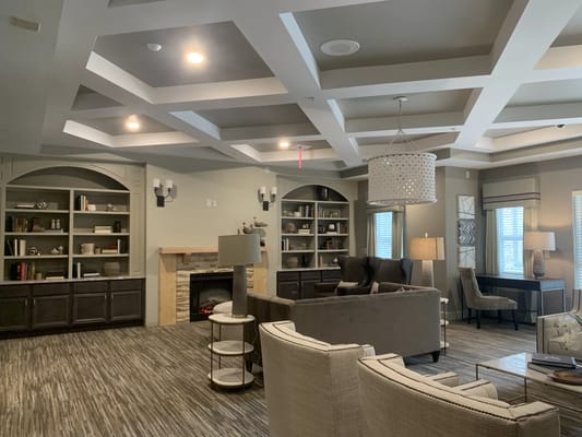 Interior common area with seating and fireplace