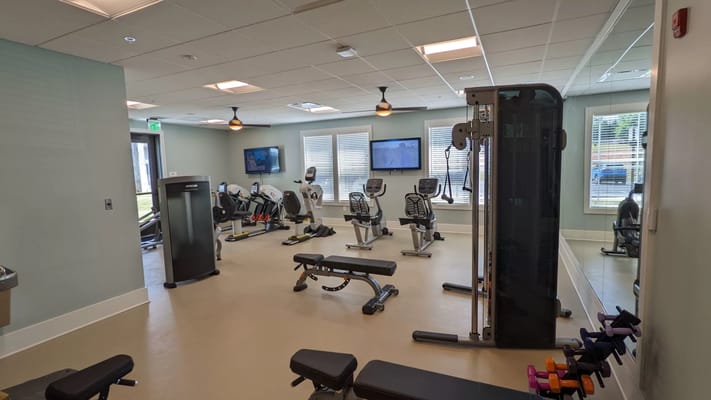 Inside view of a gym with exercise equipment