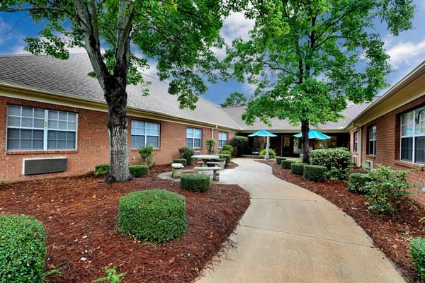 Quiet outdoor courtyard with pathways and seating