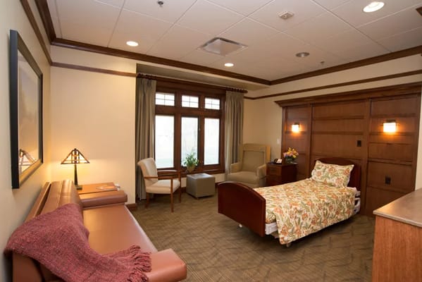 Cozy and well-furnished private room at St. Luke's Hospice.