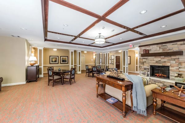 Interior view of a cozy common area with fireplace