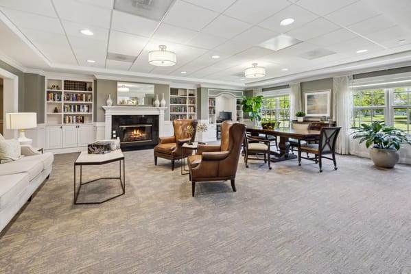 Interior common area with seating and fireplace