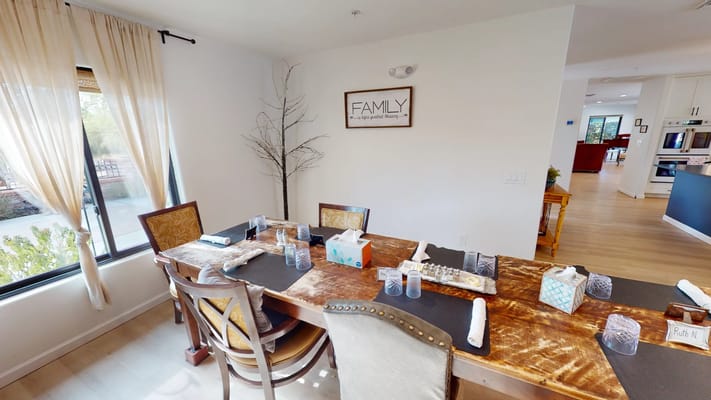 Dining area with a family-themed decor