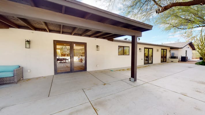 Exterior view of the facility with outdoor space and entrance