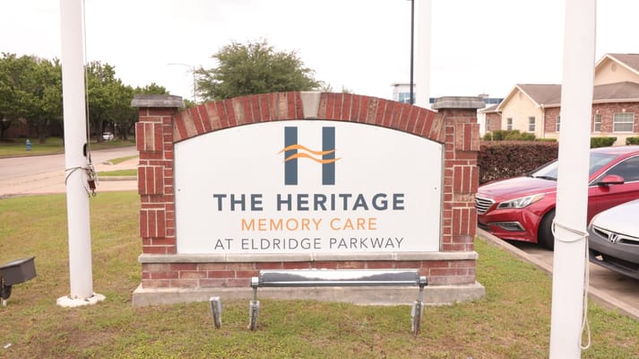 Facility sign for The Heritage Memory Care