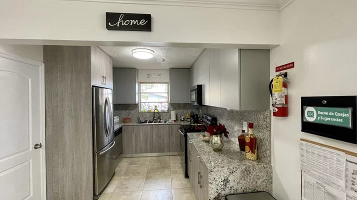 Modern kitchen with granite countertops and stainless steel appliances