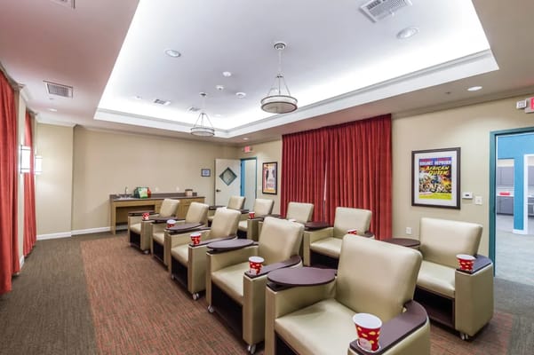 Interior activity room with plush seating and decor