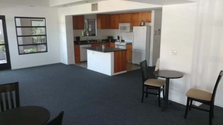 Bright interior view of a kitchen area with dining space