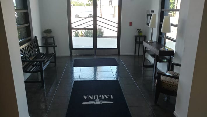 Bright lobby area with seating and decor