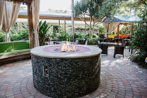 Outdoor fire pit area surrounded by seating