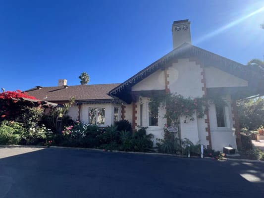 Exterior view of Alexander Gardens with vibrant gardens