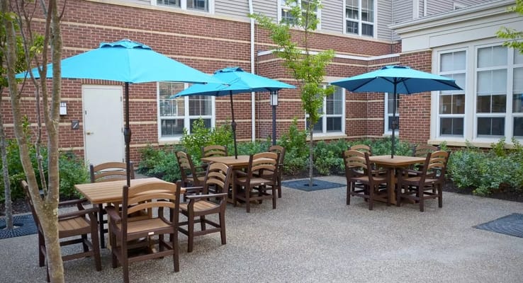 Outdoor seating area with umbrellas and tables