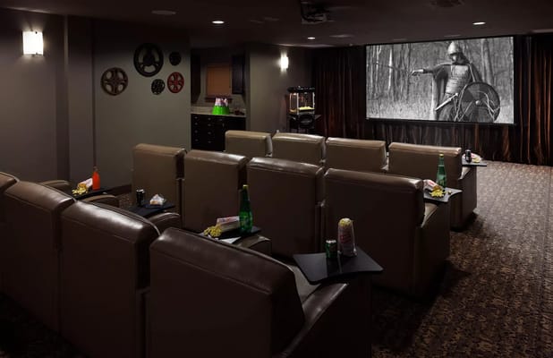 Cozy movie theater room with comfortable seating