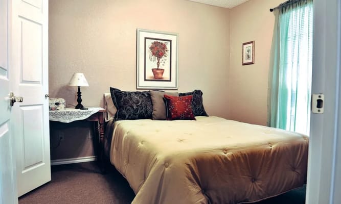 Cozy private resident bedroom with a bed and decor