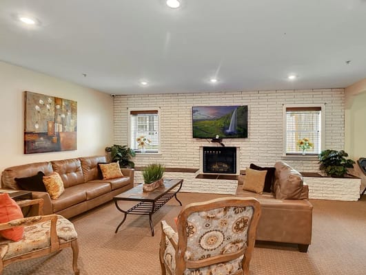 Cozy common area with seating and a television