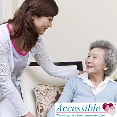 Caregiver assisting a senior woman at Home Health Care