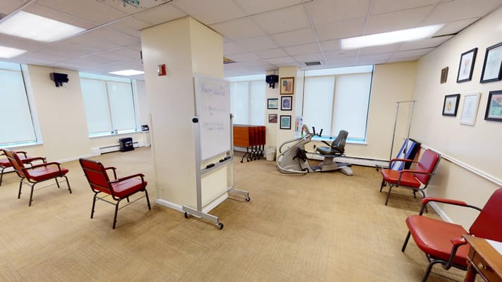 Interior view of a common area with exercise equipment
