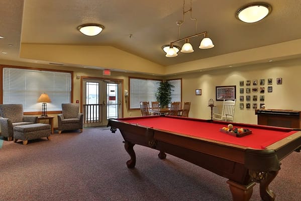 Common area with pool table and seating