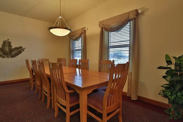 Well-furnished dining room with a large table and chairs