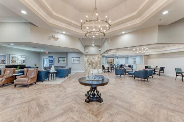 Bright interior common area with seating and decor