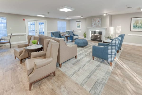 Common area with comfortable seating and a fireplace